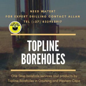 An industrial machine drilling for water in open land area by Topline boreholes in gauteng